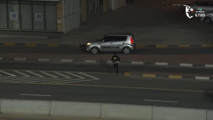 Watch: Fan runs away with ball during ILT20 match as massive six lands on road
