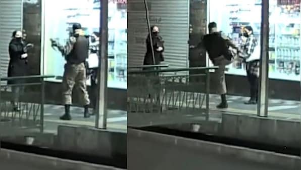 WATCH: Armed cop kicks, punches woman pedestrian on busy street in Iran's capital