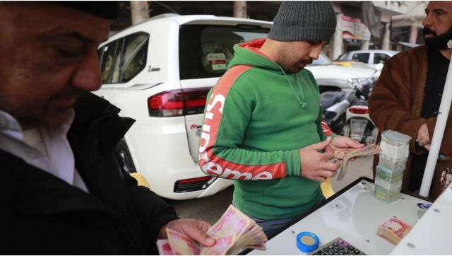 Iraq's local currency in flux as foreign transfers come under scrutiny Iraq's local currency in flux as foreign transfers come under scrutiny