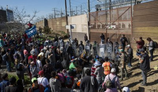 Hundreds of migrants attempt to storm the US-Mexico border Hundreds of migrants attempt to storm the US-Mexico border