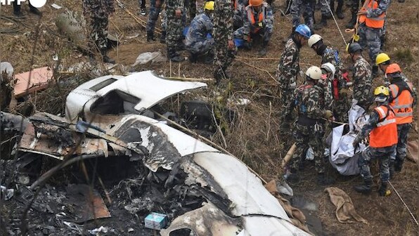 'We pray for a miracle. But, hope of finding anyone alive is nil', say Nepal plane crash rescuers