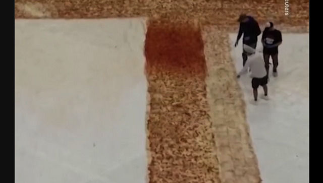 Watch video: Pizza sets record for world's largest pizza spanning nearly 14,000 square-foot Watch video: Pizza sets record for world's largest pizza spanning nearly 14,000 square-foot