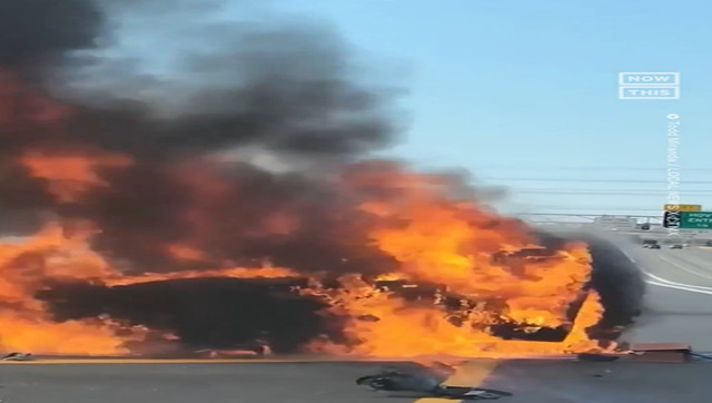 Watch: Strangers rescue woman dragging her out of car in flames; internet lauds 'Angels are real' Watch: Strangers rescue woman dragging her out of car in flames; internet lauds 'Angels are real'