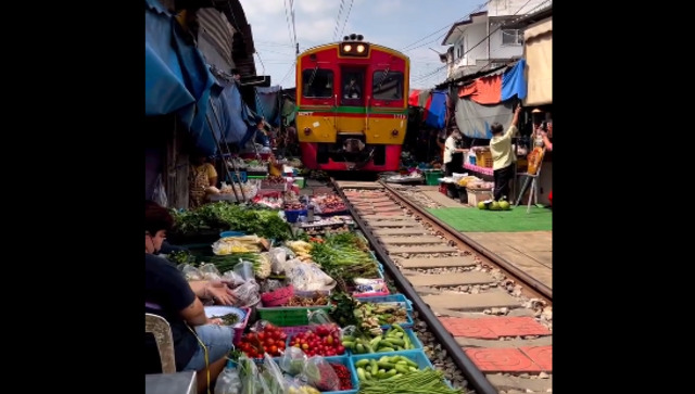 Viral video: Internet left stunned by market set on railway tracks in Thailand Viral video: Internet left stunned by market set on railway tracks in Thailand