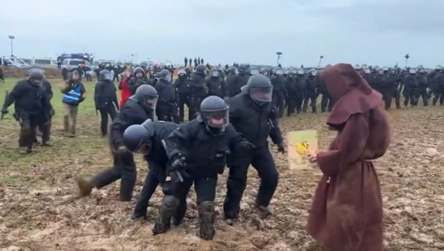 Viral video shows police officers getting stuck in mud amid ongoing German mine protests Viral video shows police officers getting stuck in mud amid ongoing German mine protests