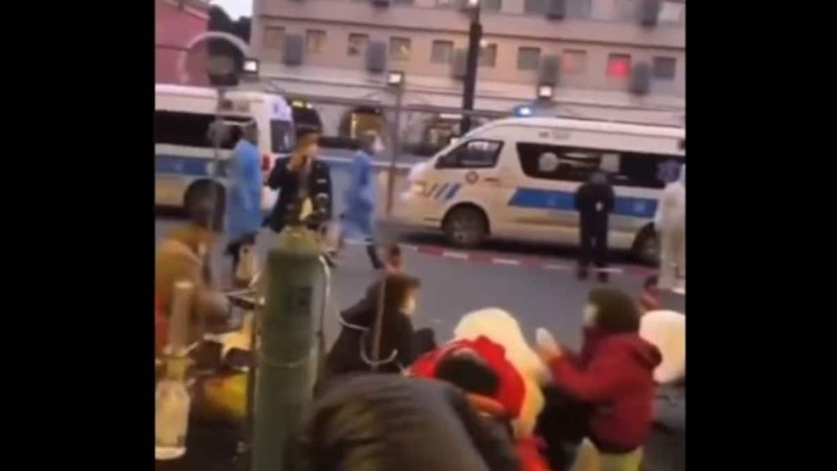 Viral Video: COVID-19 patients in China receive treatment on street outside hospital in Beijing