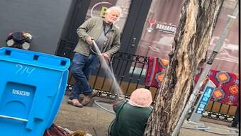 US man sprays water on homeless woman to ward her off the street; internet is angry with his actions