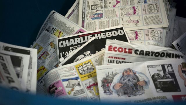 Iran Revolutionary Guards threaten French satirical magazine Charlie Hebdo with terror attack over their cartoons Iran Revolutionary Guards threaten French satirical magazine Charlie Hebdo with terror attack over their cartoons