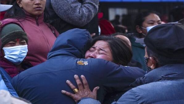 Nepali hospitals return bodies from air crash to grieving families