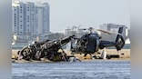 Helicopters collide over Australian beach, 4 passengers dead
