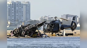 Helicopters collide over Australian beach, 4 passengers dead