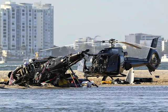 Helicopters collide over Australian beach, 4 passengers dead Helicopters collide over Australian beach, 4 passengers dead