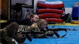 Inside Russia's 'Women's Guard', the group learning to use Kalashnikov rifles, fly drones