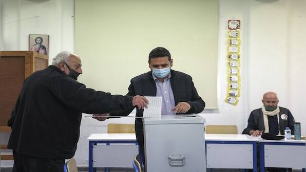 Cypriots go to the polls to elect new president in close contest