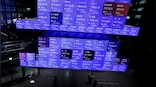 Asian shares jump, dollar eases after Jerome Powell comments