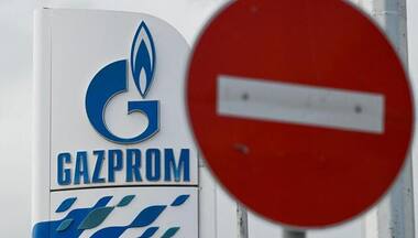 Putin warns against attempts at impeding Gazprom's work