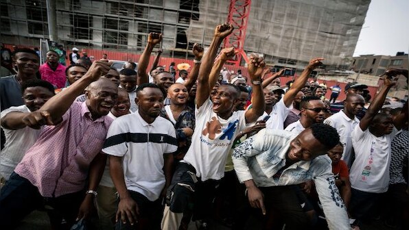 Nigeria counts votes after tight election hit by long delays