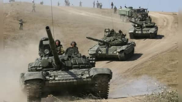 WATCH: Wading through Ukrainian minefield, Russian armoured column blown up