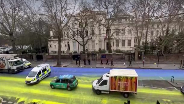 Ukrainian flag painted on street outside Russian embassy in London; 4 arrested Ukrainian flag painted on street outside Russian embassy in London; 4 arrested