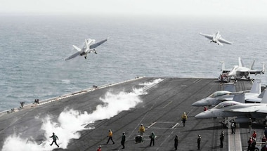 Chinese military shoos away US navy aircraft from South China sea, reports claim