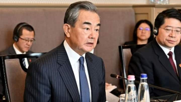China-Russia relations 'rock solid', will stand challenges of volatile international situation: Wang Yi