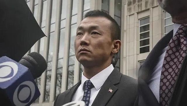 Baimadajie Angwang: Arrested for being a Chinese spy, the New York cop wants his badge back Baimadajie Angwang: Arrested for being a Chinese spy, the New York cop wants his badge back