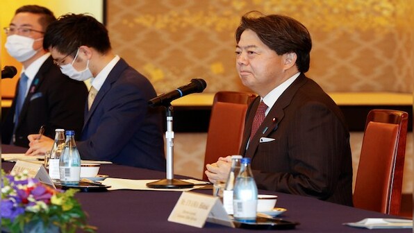 Japan's foreign minister calls for early release of detained national during talks in China