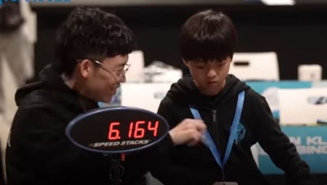 Watch: 9-year-old boy from China solves Rubik's cube in record-breaking average time Watch: 9-year-old boy from China solves Rubik's cube in record-breaking average time