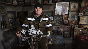 Viktor Mikhalev: The Ukrainian smith, who turns guns and ammunition into 'flowers of war'