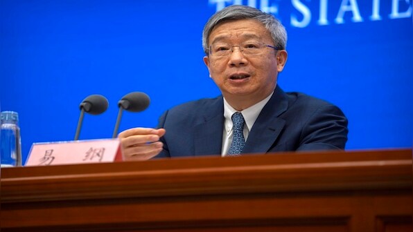 China retains Yi Gang as central bank chief in unexpected move
