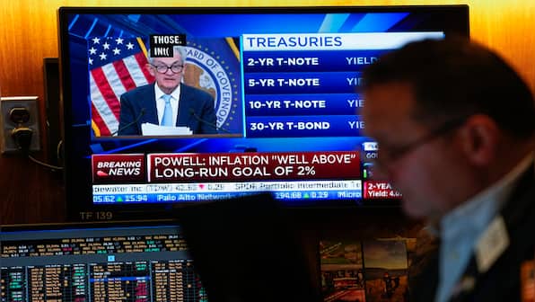 US stocks tumble after Fed rate hike, concerns on economy