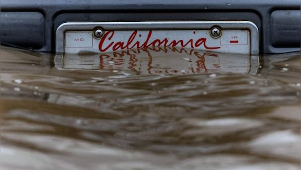 Flooded California sees evacuations, power outages, road closures, New York buried under snow