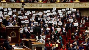 Macron to address nation after government survives no-confidence vote