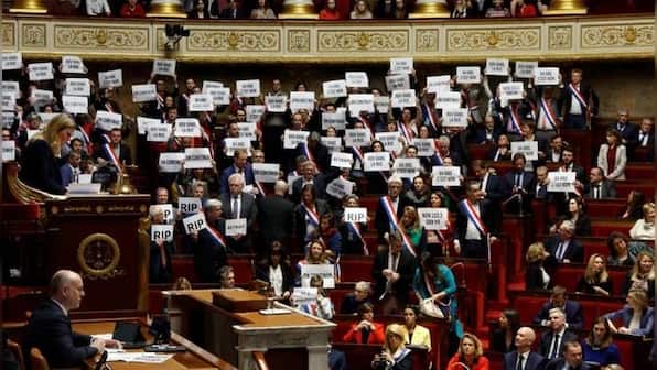 Macron to address nation after government survives no-confidence vote