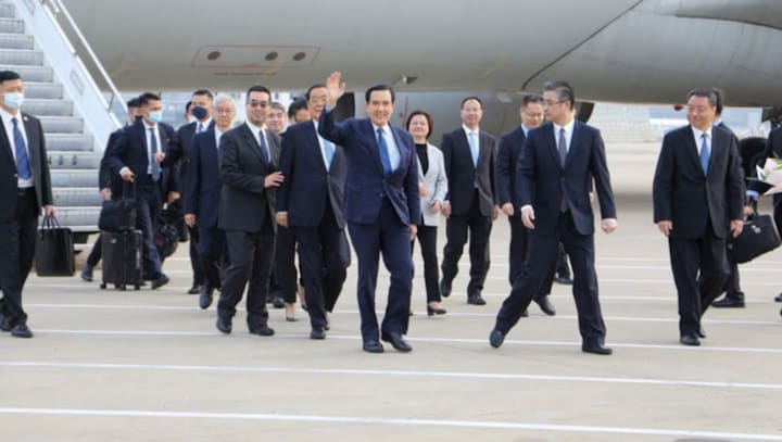 Former Taiwan president on China visit, pledges to bring peace