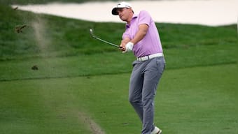 Christiaan Bezuidenhout and Adam Svensson in lead before play stopped at Players Championship