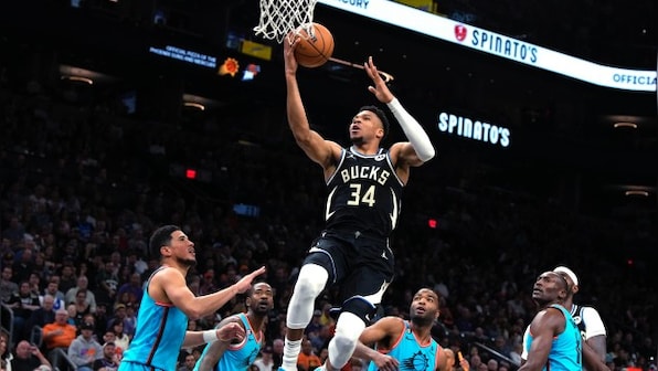 NBA: Bucks clinch playoff spot, top Suns 116-104 for 50th season win