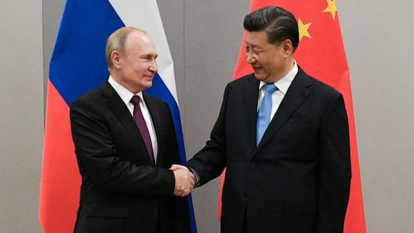 Russia’s Vladimir Putin flaunts alliance with Chinese president Xi Jinping
