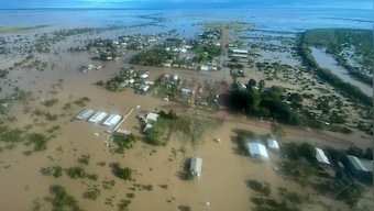 Heavy rain in Australia triggers flood evacuations in Queensland