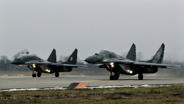 Poland urges Germany to approve export of old fighter jets to Ukraine