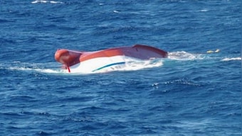 Fishing boat capsizes off disputed remote Japan islands; One dead, six missing