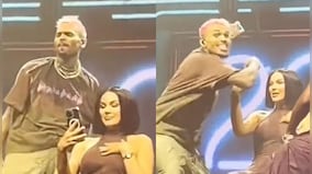 Chris Brown tosses fan's phone in crowd during live performance; Twitter reacts