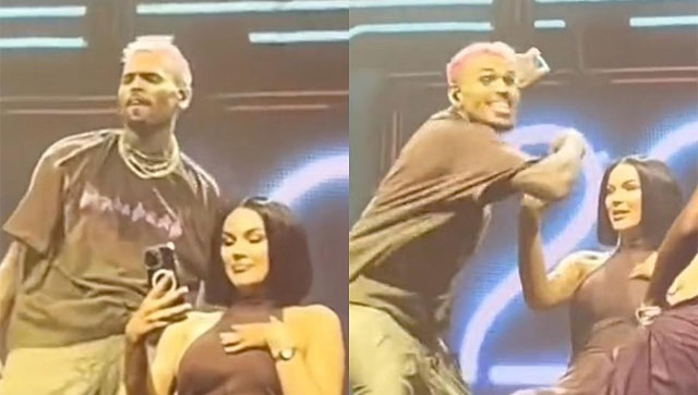 Chris Brown tosses fan's phone in crowd during live performance; Twitter reacts Chris Brown tosses fan's phone in crowd during live performance; Twitter reacts