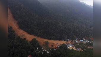 Indonesia landslide deaths climb to 21; dozens still missing