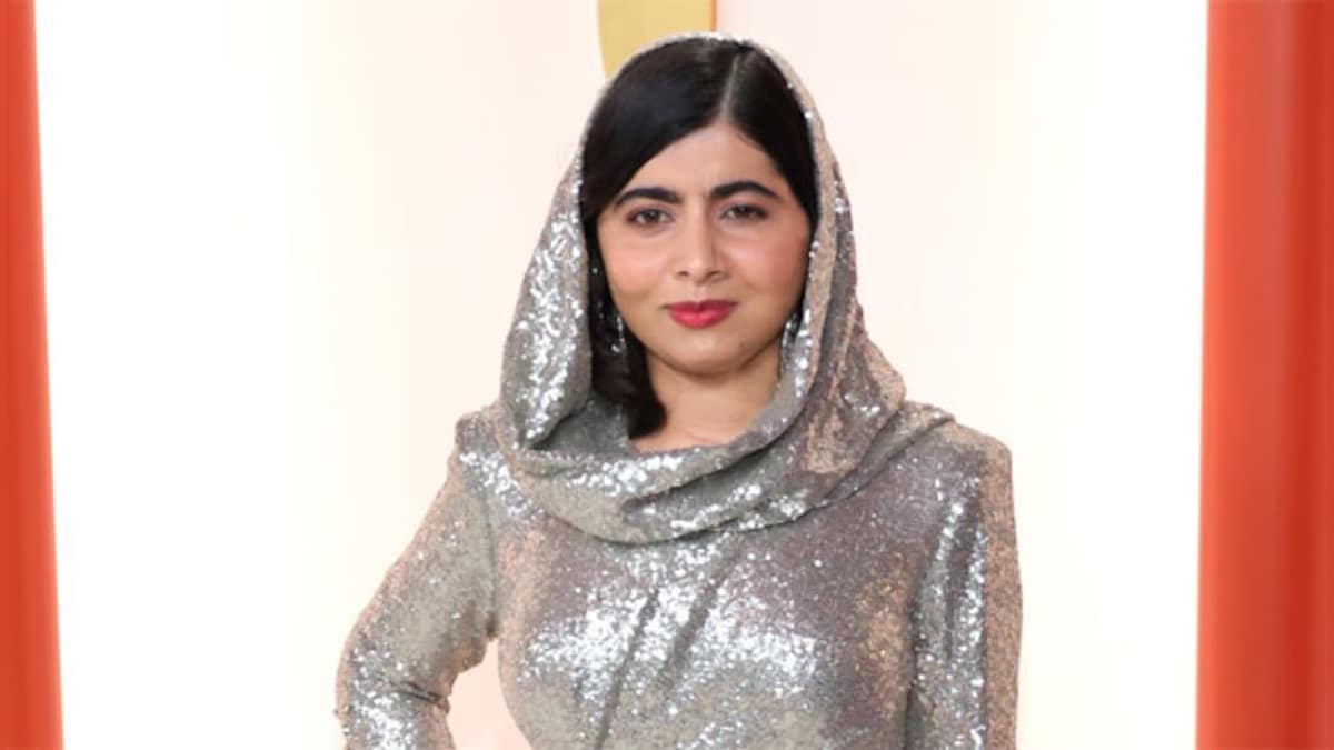 Malala Yousafzai shines in silver sequin-covered hooded gown as she debuts at the Oscars 2023