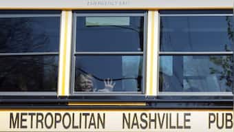 Police release video of Nashville school shooter blasting through glass doors, roaming halls
