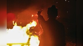 Iran protesters return to streets during fire festival, burn hijabs & Khamenei's posters