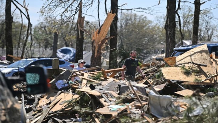 Darkness, Death and Destruction: Terrifying tornadoes wreak havoc in several American states