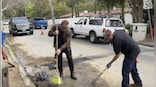 Watch: Arnold Schwarzenegger fixes 'giant pothole' in California neighbourhood
