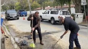 Watch: Arnold Schwarzenegger fixes 'giant pothole' in California neighbourhood
